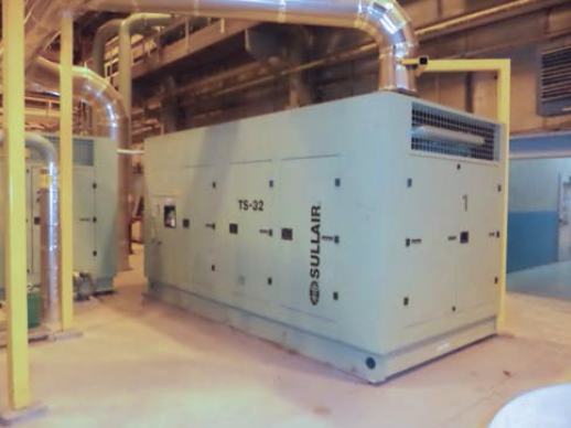Four large, two-stage, water-cooled compressors with spiral valve control are used as trim capacity.
