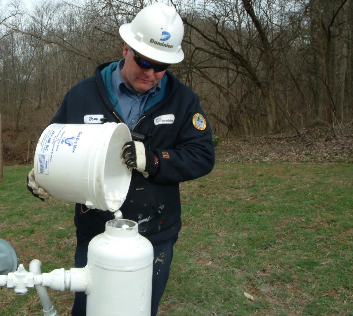 Deliquescent gas dryer is filled 
