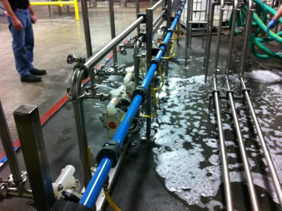 Diaphragm pump header regulated to 55 psig