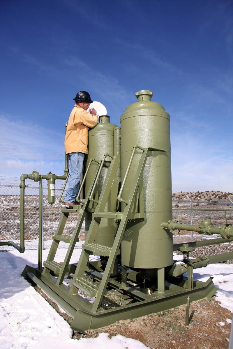 Deliquescent gas dryers